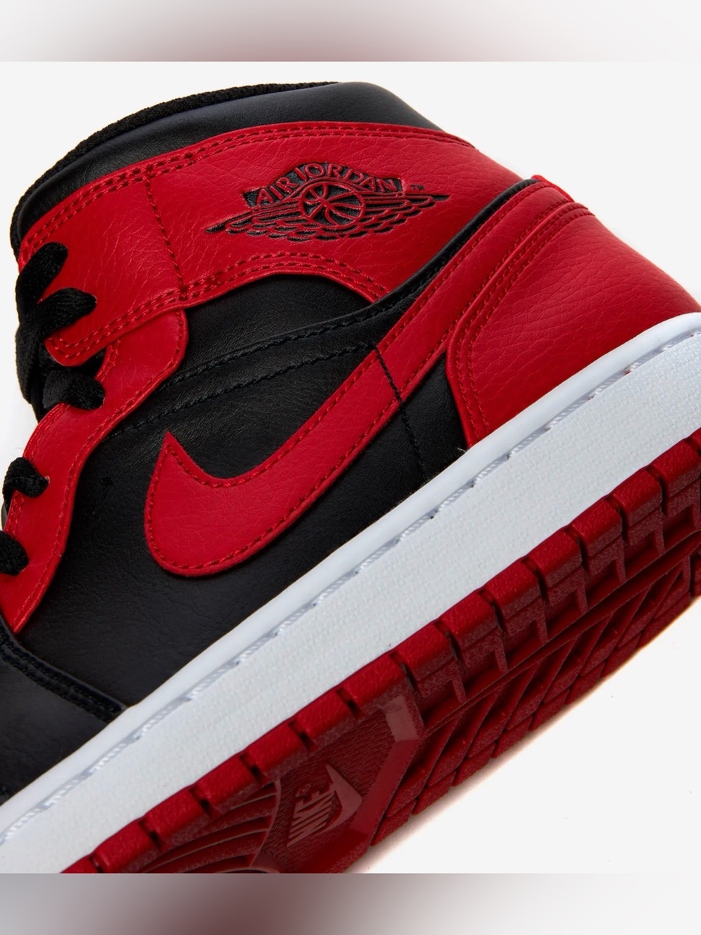 Jordan Air Jordan 1 Mid Red and Black Sneakers